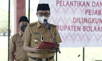 Bupati Bolsel Hi Iskandar Kamaru Spt saat memberikan sambutan di Rakorev Penyelenggaraan Pemerintah Desa.