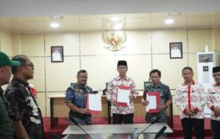 Pemda Bolsel dan Sub Divre Bulog Bolmong sepakat dalam penyerahan hibah lahan untuk pembangunan gudang Bulog di Bolsel, Kamis 4 Desember 2024. (Foto: IST)
